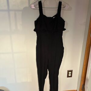 BCBG black jumpsuit with ruffled top